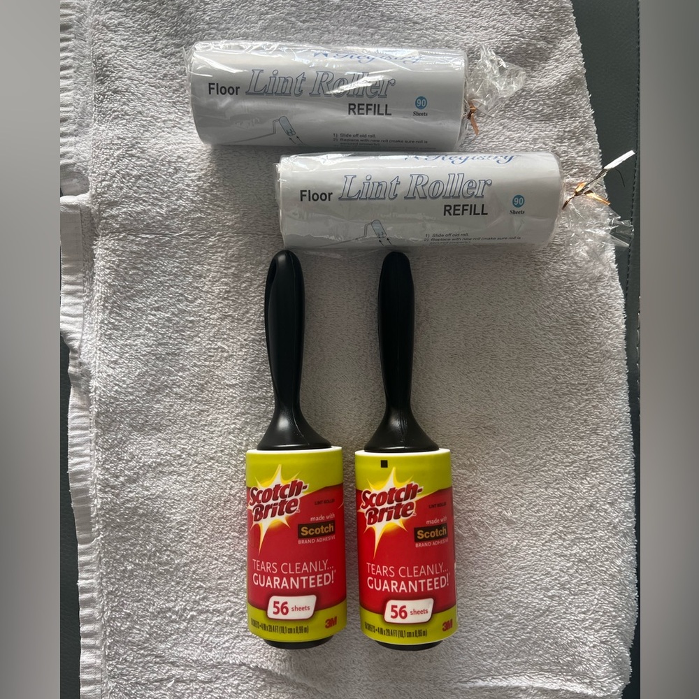 NEW BUNDLE OF LINT ROLLERS- 2 WITH HANDLES/ 2 REFILLS